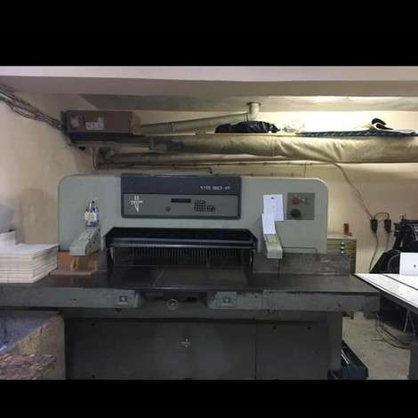 Used Polar 115 paper cutter for sale.