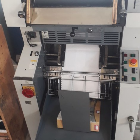 Used Ryobi Continuous Form Printing Machines and Polar paper cutter for sale.
